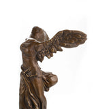 Iconic bronze sculpture inspired by the Winged Victory of Samothrace. A timeless symbol of triumph and classical beauty, perfect for refined interiors and art collectors.