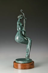 Profile view of a bronze woman holding a traditional Chinese pipa in a seated position