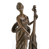 Elegant Art Nouveau bronze female cellist sculpture in flowing gown, woman playing cello statue on stepped black marble base, loss wax casting musical fine art.