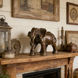 Majestic African elephant bronze statue featuring rich patina and polished highlights. A powerful wildlife sculpture symbolizing strength, wisdom, and prosperity.