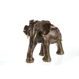 Majestic African elephant bronze statue featuring rich patina and polished highlights. A powerful wildlife sculpture symbolizing strength, wisdom, and prosperity.