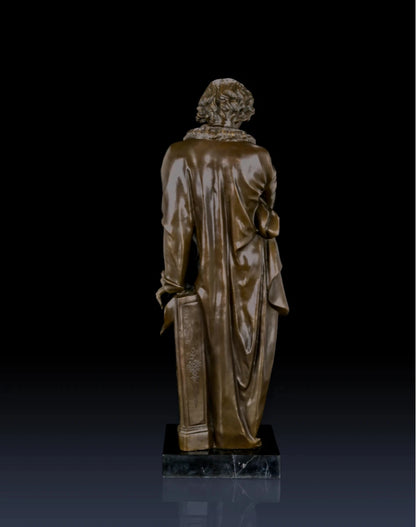 Full-length bronze statue of Ludwig van Beethoven, capturing his creative genius and strength. Handcrafted sculpture with marble base—ideal for collectors, musicians, and statement interiors.