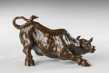 Wall Street charging bull bronze sculpture in a powerful pose, realistic bull market statue on black marble base, loss wax casting fine art.