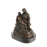 Classical bronze Pietà sculpture depicting the Virgin Mary holding Christ after the Crucifixion. A powerful religious artwork symbolizing faith, grief, and maternal love.