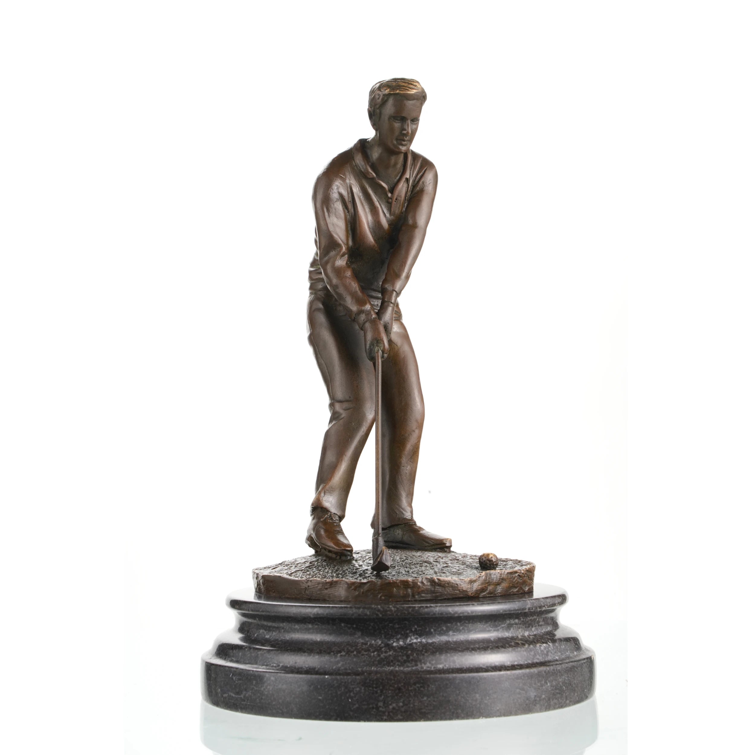 Bronze golfer statue putting with ball on marble base