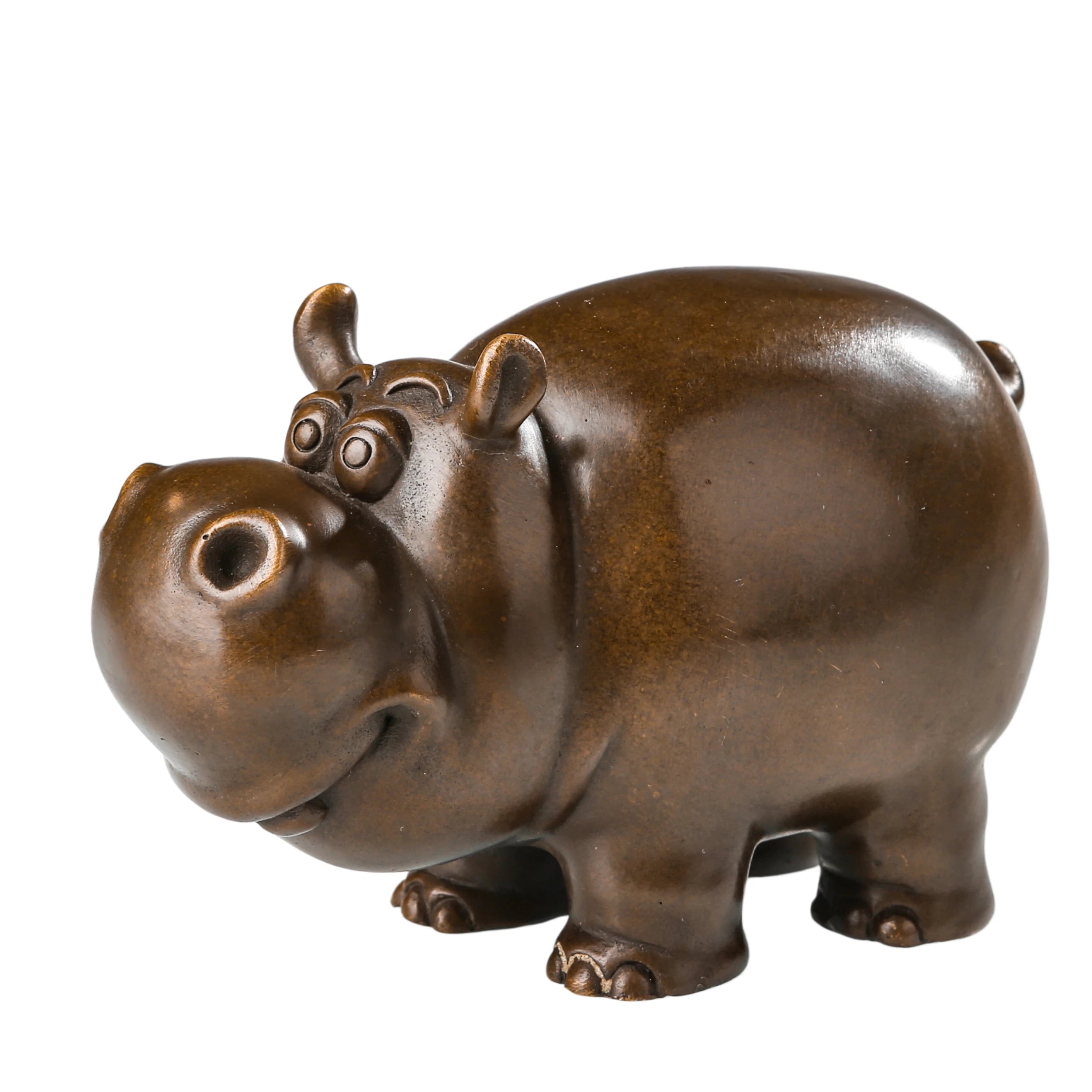 Cute handcrafted bronze cow sculpture with a cartoon-inspired design for modern home decor.