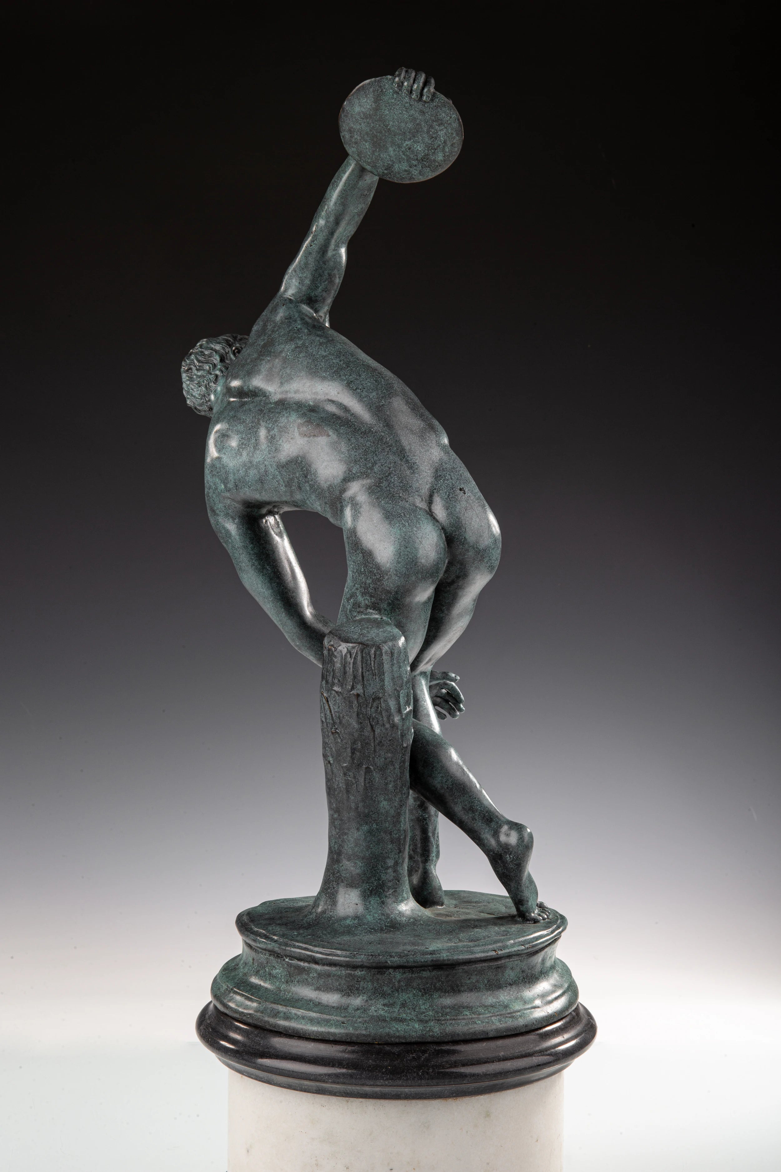 Discobolus bronze sculpture of classical Greek discus thrower on marble base