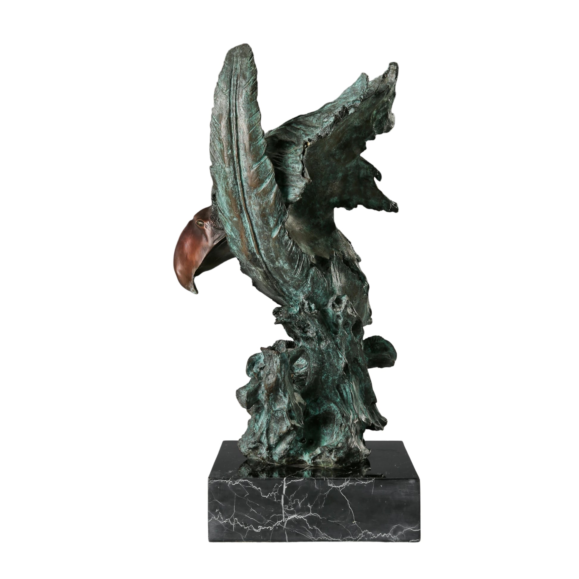 Abstract bronze eagle head sculpture with striking verdigris patina and marble base. A bold wildlife statue symbolizing freedom, strength, and vision.