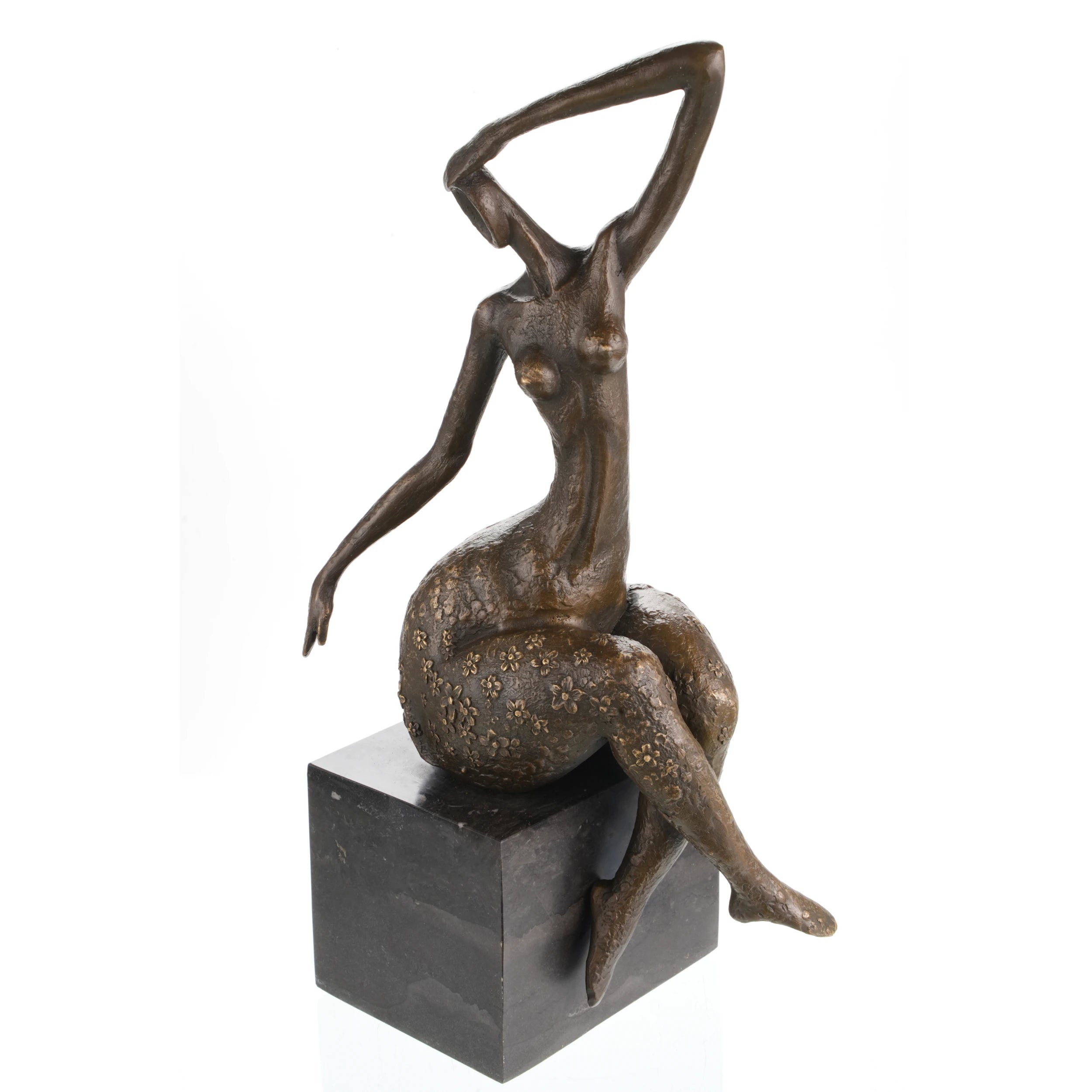 Elegant abstract bronze sculpture of a seated female figure with flowing pose and golden floral details. A refined statement piece for modern interiors.