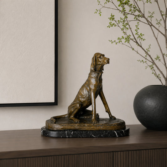 Elegant seated pointer dog bronze sculpture handcrafted using the lost-wax casting method. A refined hunting dog statue symbolizing loyalty, discipline, and noble sporting tradition.