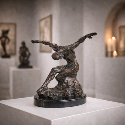 Expressionist bronze male figure statue in dynamic crouching pose, raw muscular human form statue on oval black marble base, lost wax casting fine art.