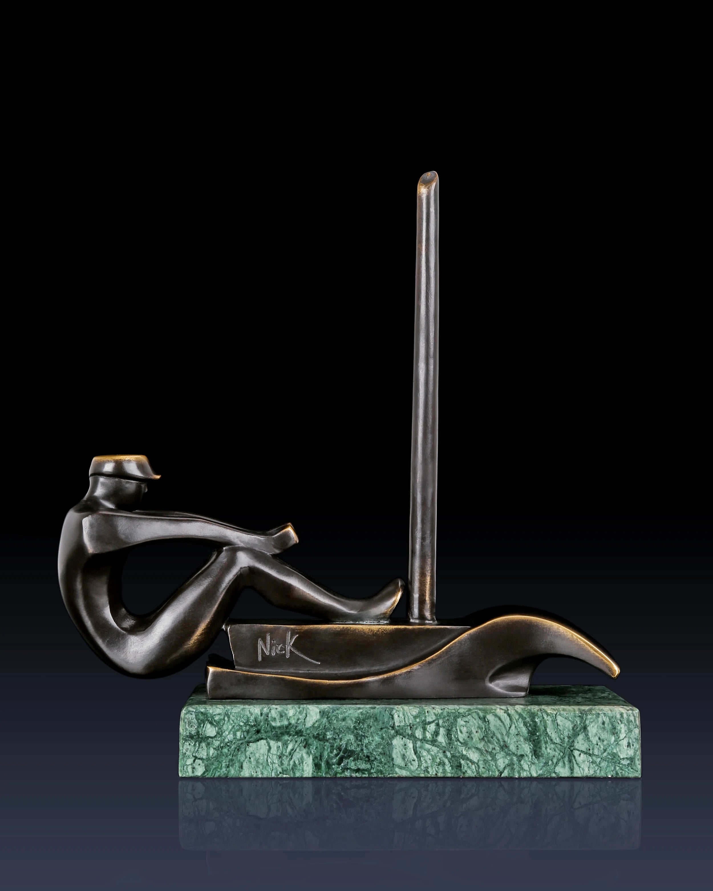 Handcrafted abstract bronze sailing sculpture with stylized sailor and modern sailboat design