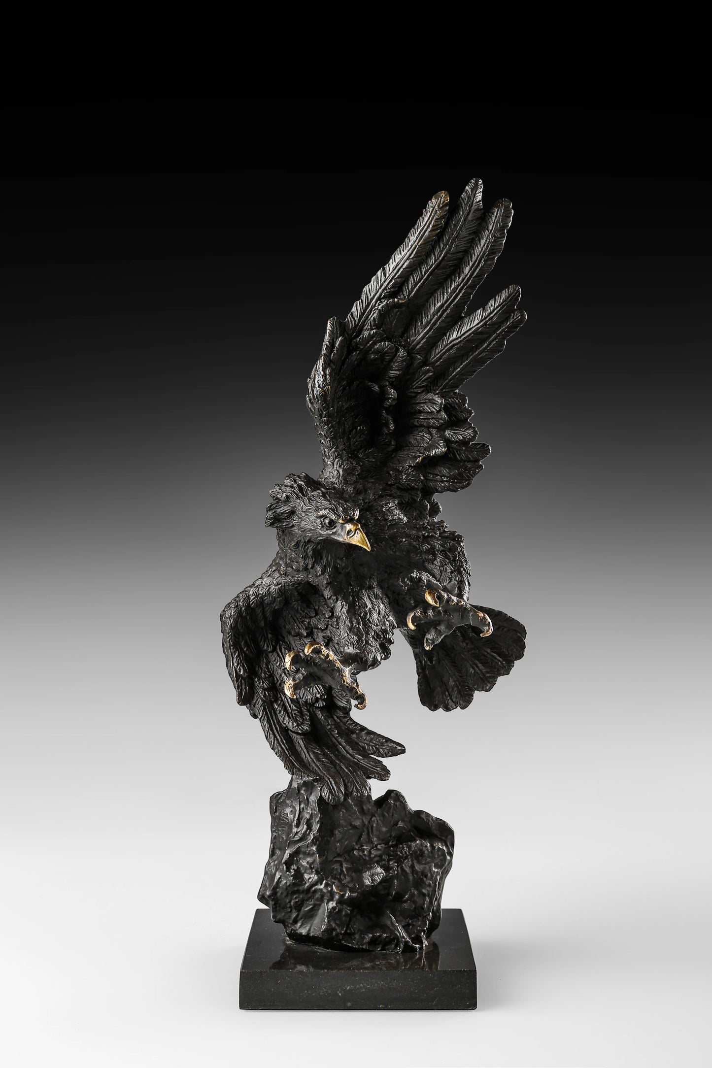 Dynamic bald eagle bronze sculpture in a powerful diving pose with marble base. A striking wildlife statue symbolizing strength, freedom, and leadership.