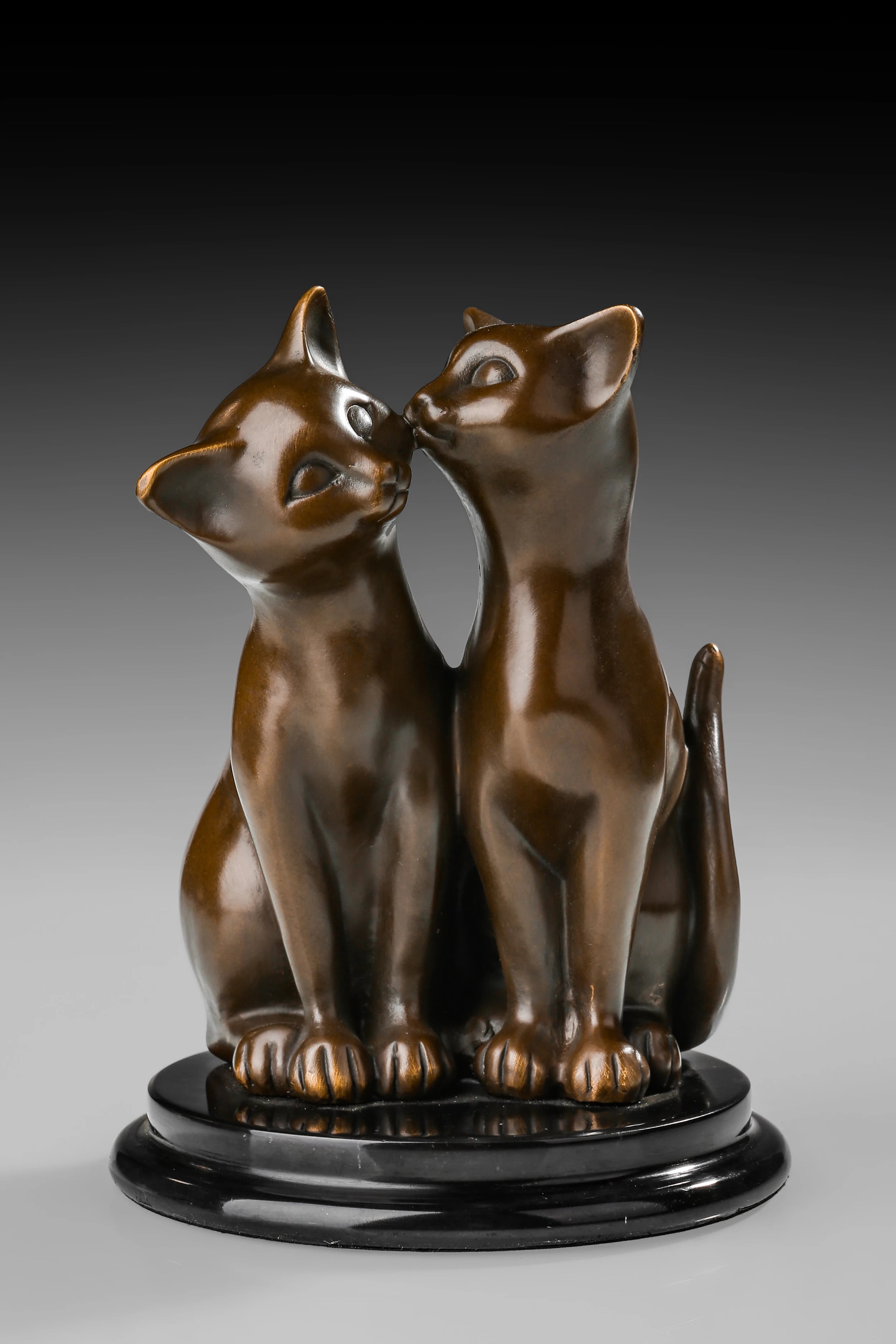 Handcrafted bronze cat couple sculpture with two affectionate cats sitting closely together