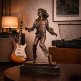 Dynamic bronze Michael Jackson sculpture in classic dance pose, King of Pop statue with flowing hair and open jacket on black marble base, loss wax casting music memorabilia.
