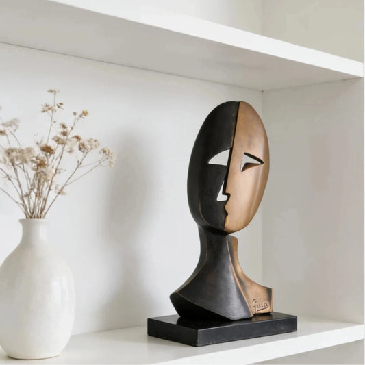 Modern abstract bronze split-face bust sculpture, signed Guia Cubist style art, black and warm bronze two-tone patina on polished plinth.
