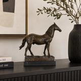 Naturalistic standing bronze horse sculpture with detailed musculature and flowing mane, realistic equestrian statue on black marble base, lost wax casting fine art.