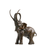 A highly detailed naturalistic bronze elephant sculpture with its trunk curled upward, a timeless symbol of strength and good fortune for office decor.