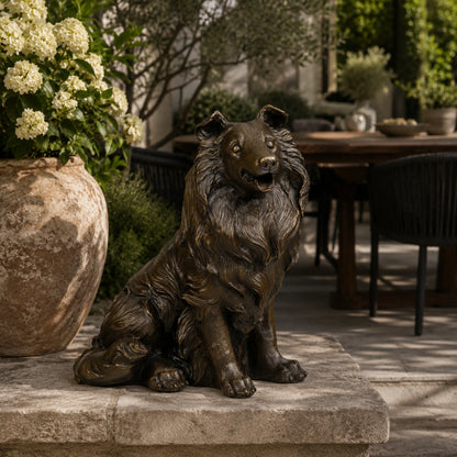 Realistic bronze collie sculpture crafted using the lost-wax casting method. An elegant seated dog statue symbolizing loyalty, intelligence, and companionship.