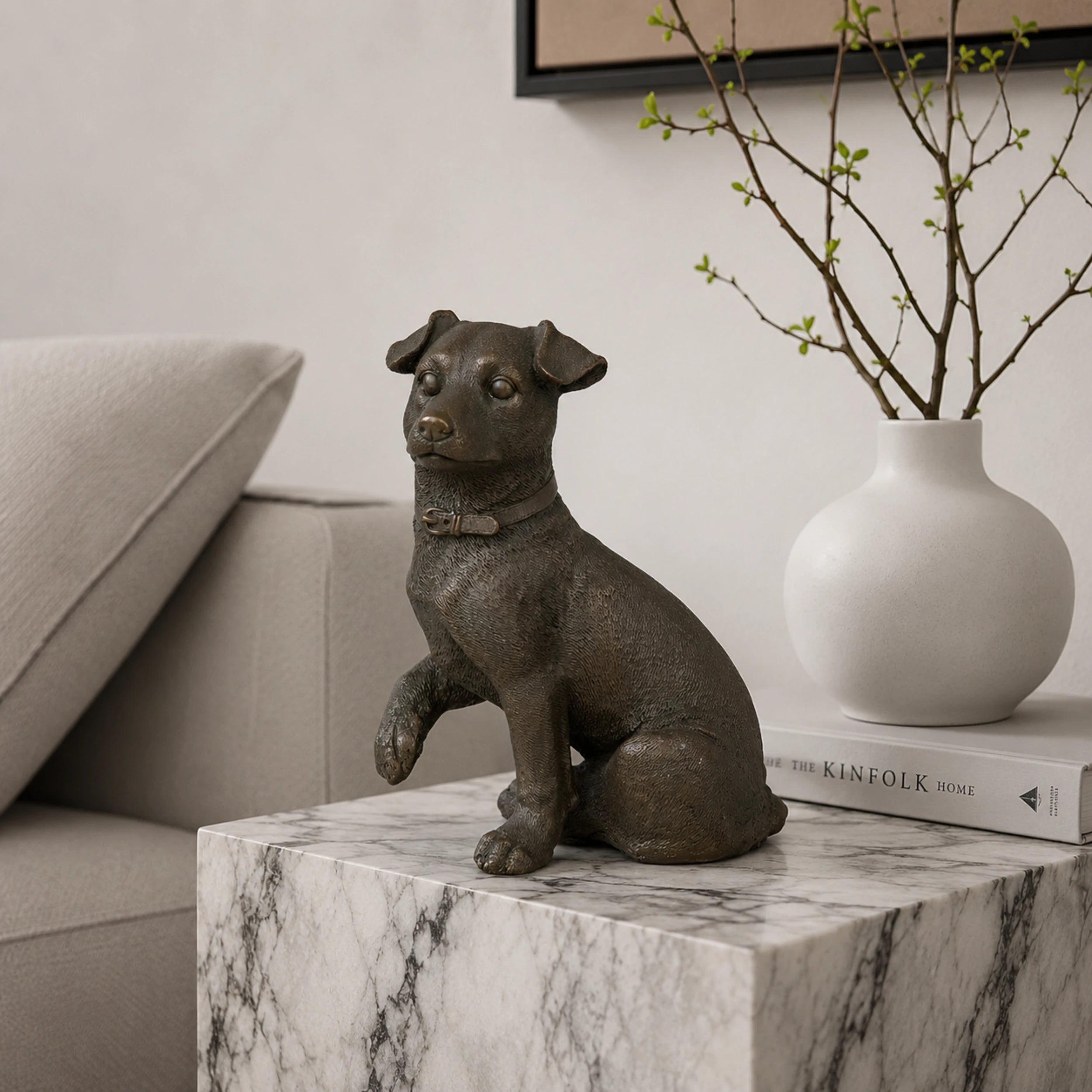 Realistic bronze terrier sculpture crafted using the lost-wax casting method. A charming seated dog statue symbolizing loyalty, energy, and companionship.