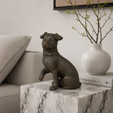 Realistic bronze terrier sculpture crafted using the lost-wax casting method. A charming seated dog statue symbolizing loyalty, energy, and companionship.