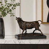 Realistic walking bronze bull sculpture with noble bearing and detailed anatomy, walking animal statue on red-veined black marble base, loss wax casting fine art.