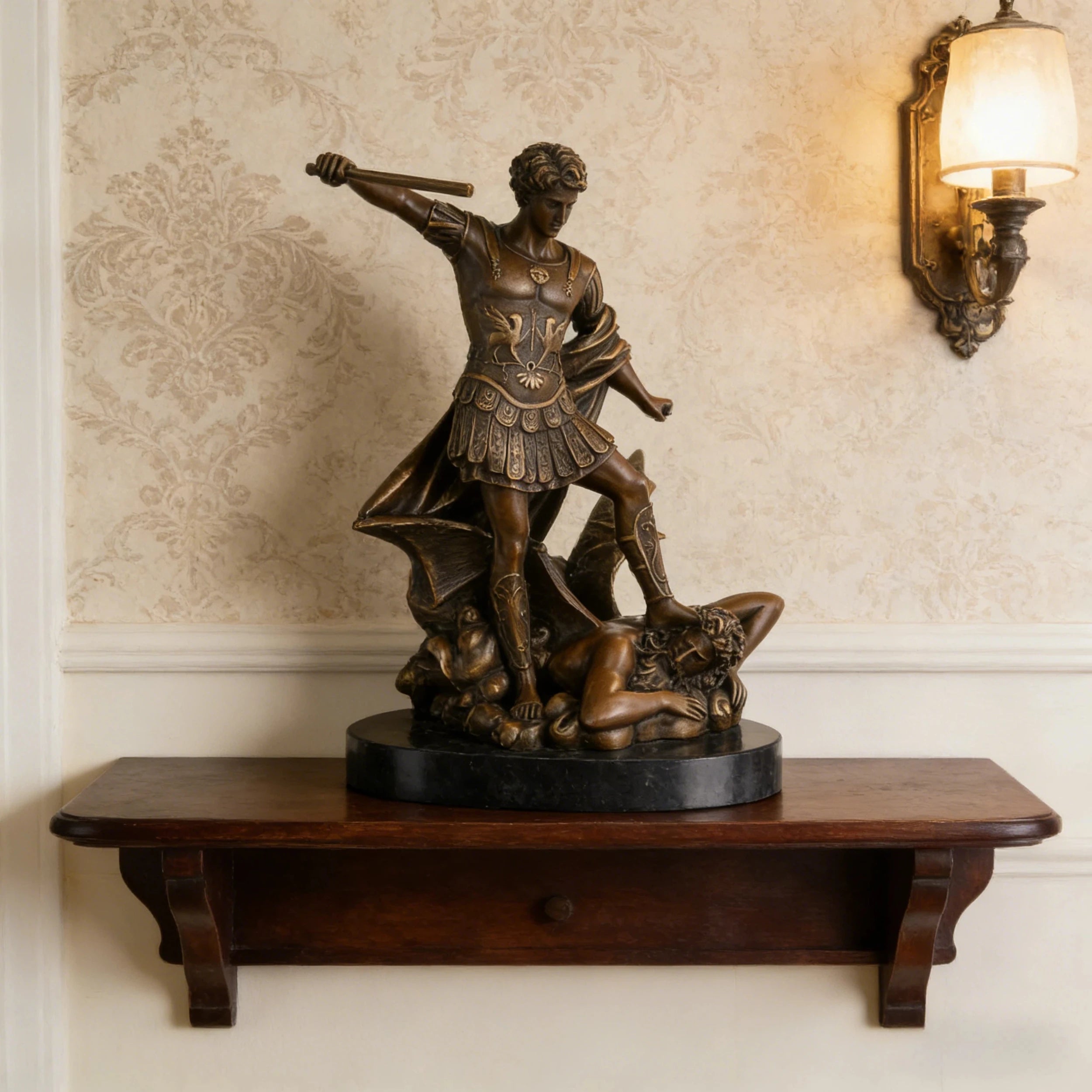 Saint Michael the Archangel bronze statue vanquishing Satan, detailed Roman armor warrior angel sculpture on oval black marble base, loss wax casting religious art.