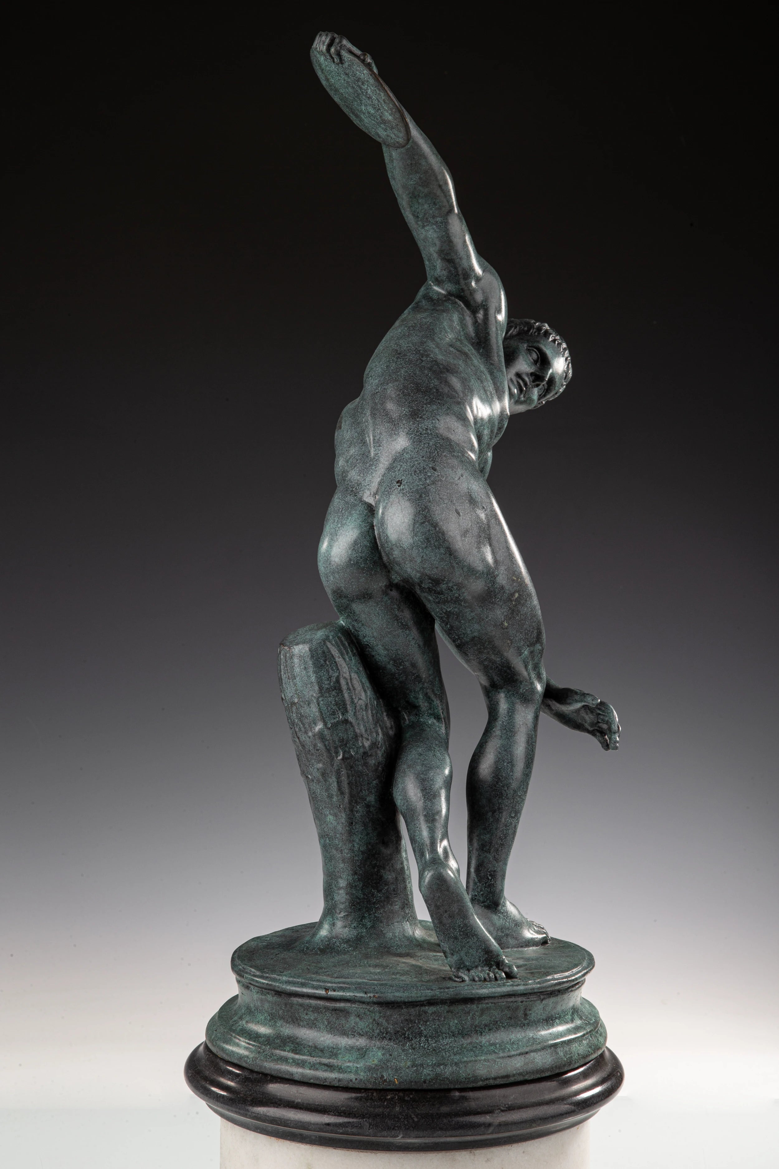 Classical Discobolus bronze sculpture inspired by ancient Greek art. A timeless discus thrower statue symbolizing athleticism, balance, and beauty.