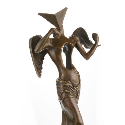 Surrealist bronze angel sculpture with hollow torso and geometric head, abstract winged statue on black marble base, loss wax casting avant-garde art.