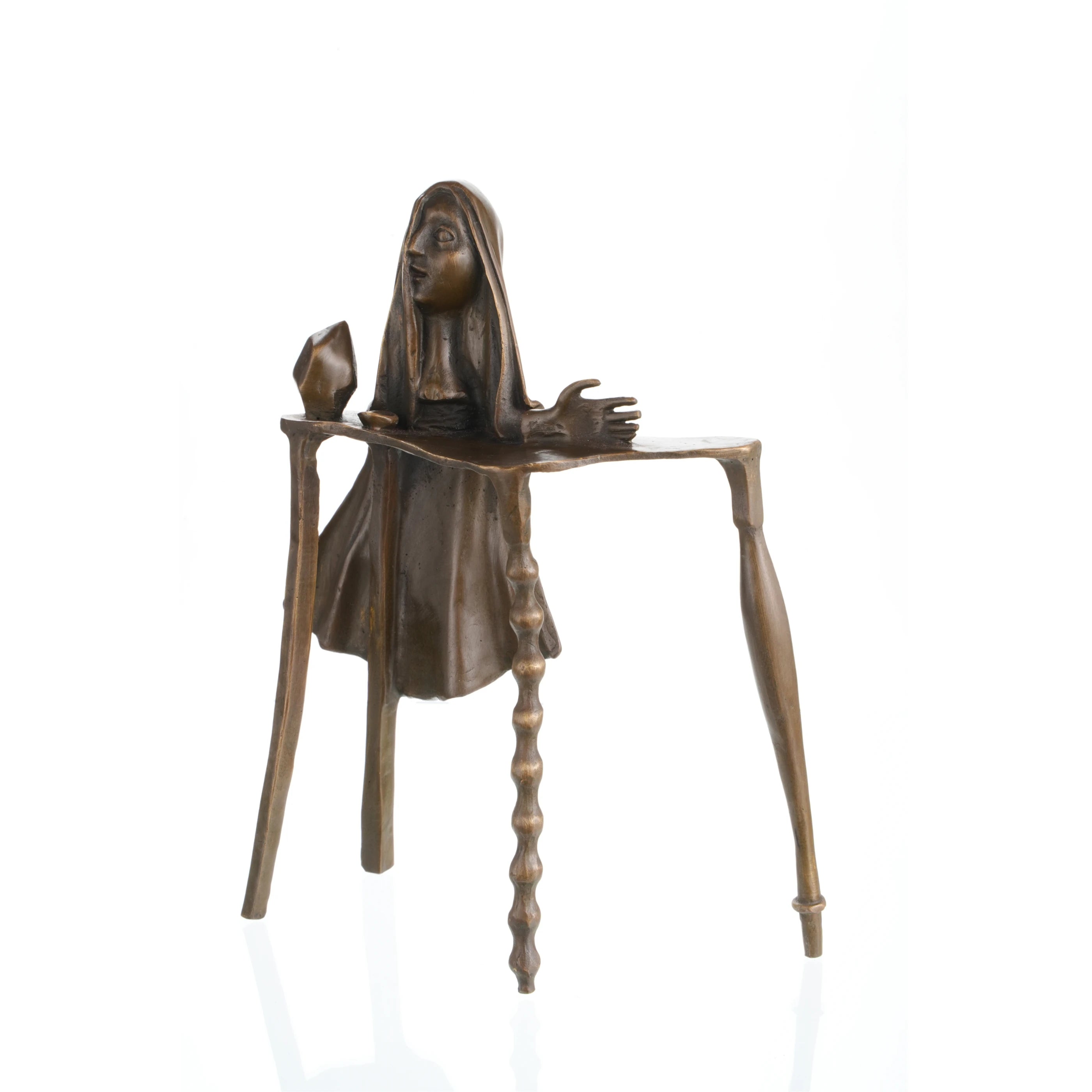 Surrealist bronze sculpture of female figure emerging from abstract table