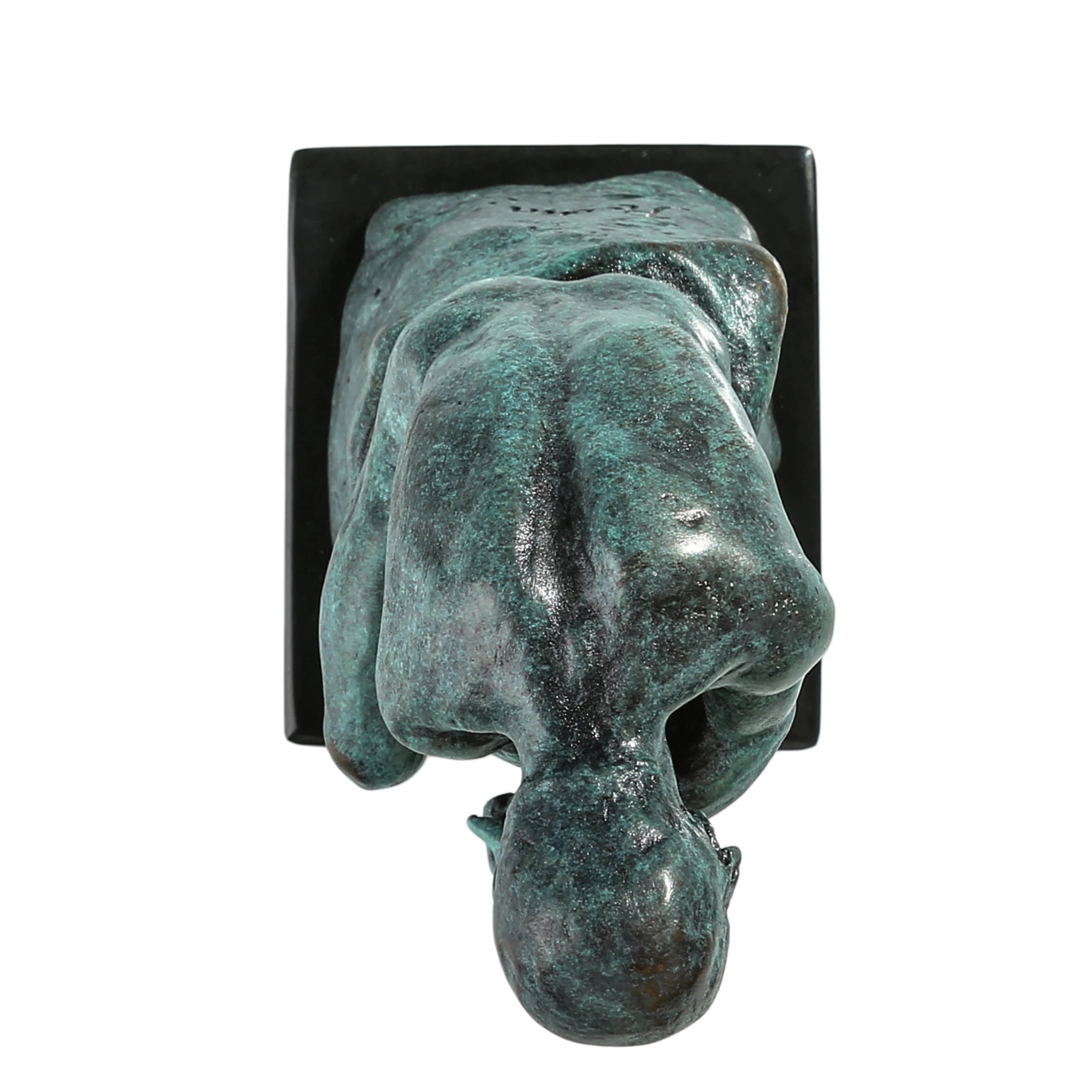 Top angle of the bronze Thinker sculpture highlighting the contemplative pose