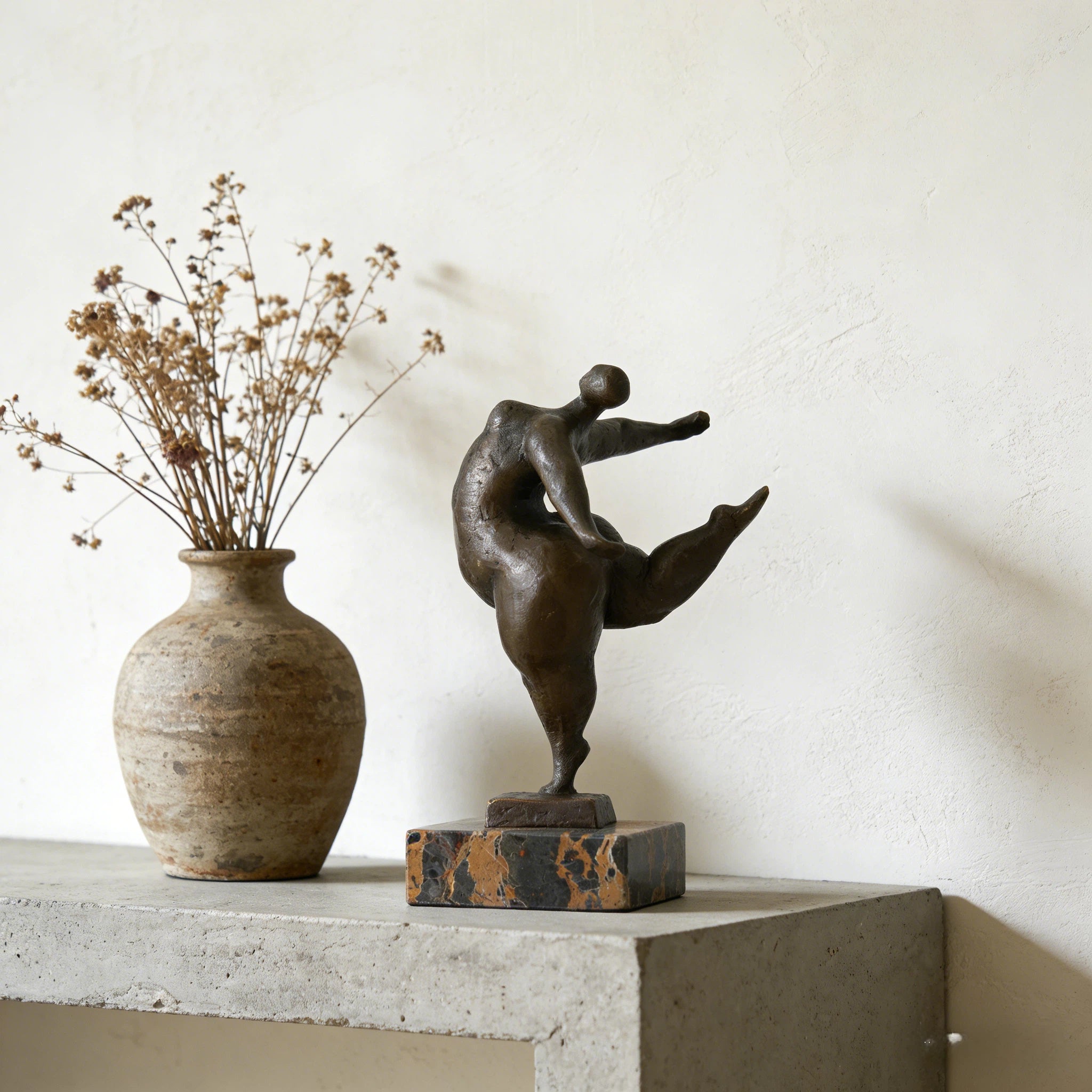 Voluptuous dancer bronze sculpture one leg balance pose