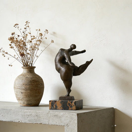 Voluptuous dancer bronze sculpture one leg balance pose