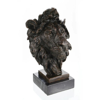 This is a powerful bronze bust of a lion, crafted using the lost-wax casting method. The sculpture focuses on the lion’s head and upper neck, capturing the animal in a moment of intense focus and regal authority. 