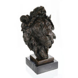This is a powerful bronze bust of a lion, crafted using the lost-wax casting method. The sculpture focuses on the lion’s head and upper neck, capturing the animal in a moment of intense focus and regal authority. 