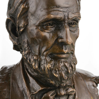 Realistic Abraham Lincoln bronze bust on black marble base, luxury executive office decor, historical American president statue.