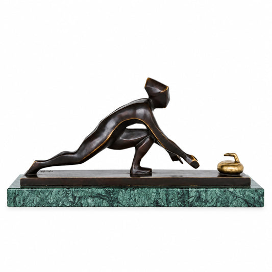 Handcrafted abstract bronze curling player sculpture in a low sliding pose reaching toward a curling stone