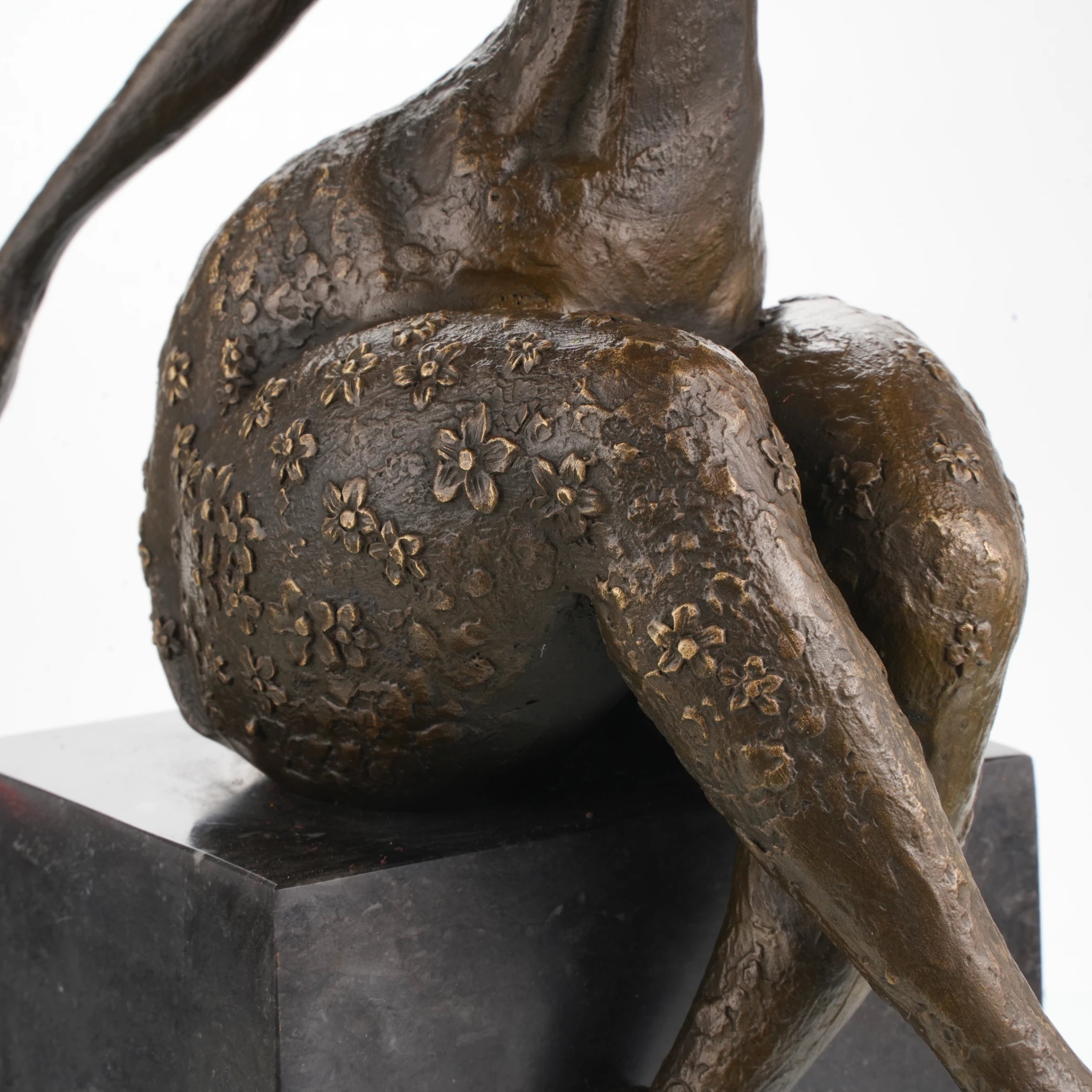 Minimalist female upper body detail in modern sculpture