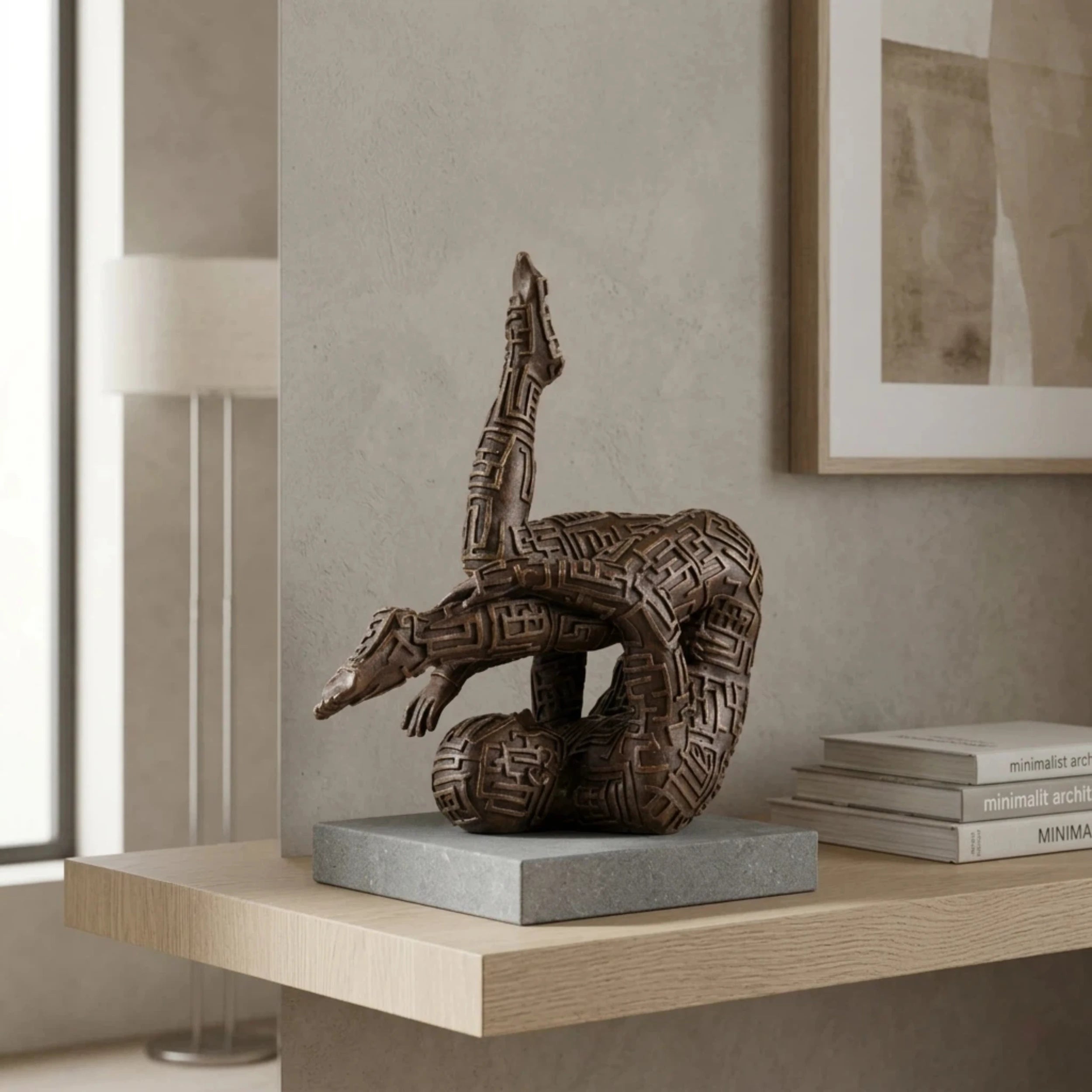 Contemporary abstract bronze sculpture of a contorted gymnastic figure with maze patterns, symbolic labyrinth human form statue, loss wax casting avant-garde art.
