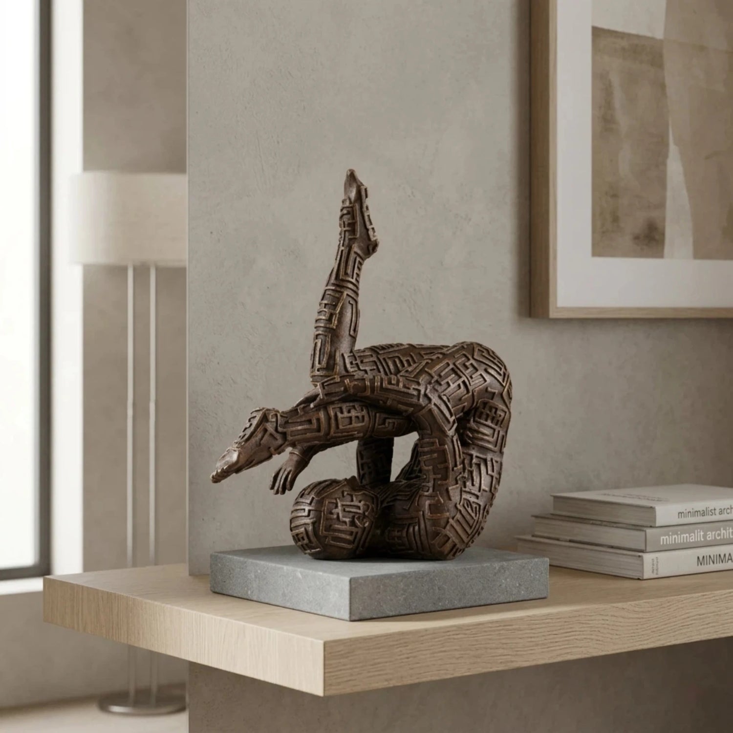 Contemporary abstract bronze sculpture of a contorted gymnastic figure with maze patterns, symbolic labyrinth human form statue, loss wax casting avant-garde art.