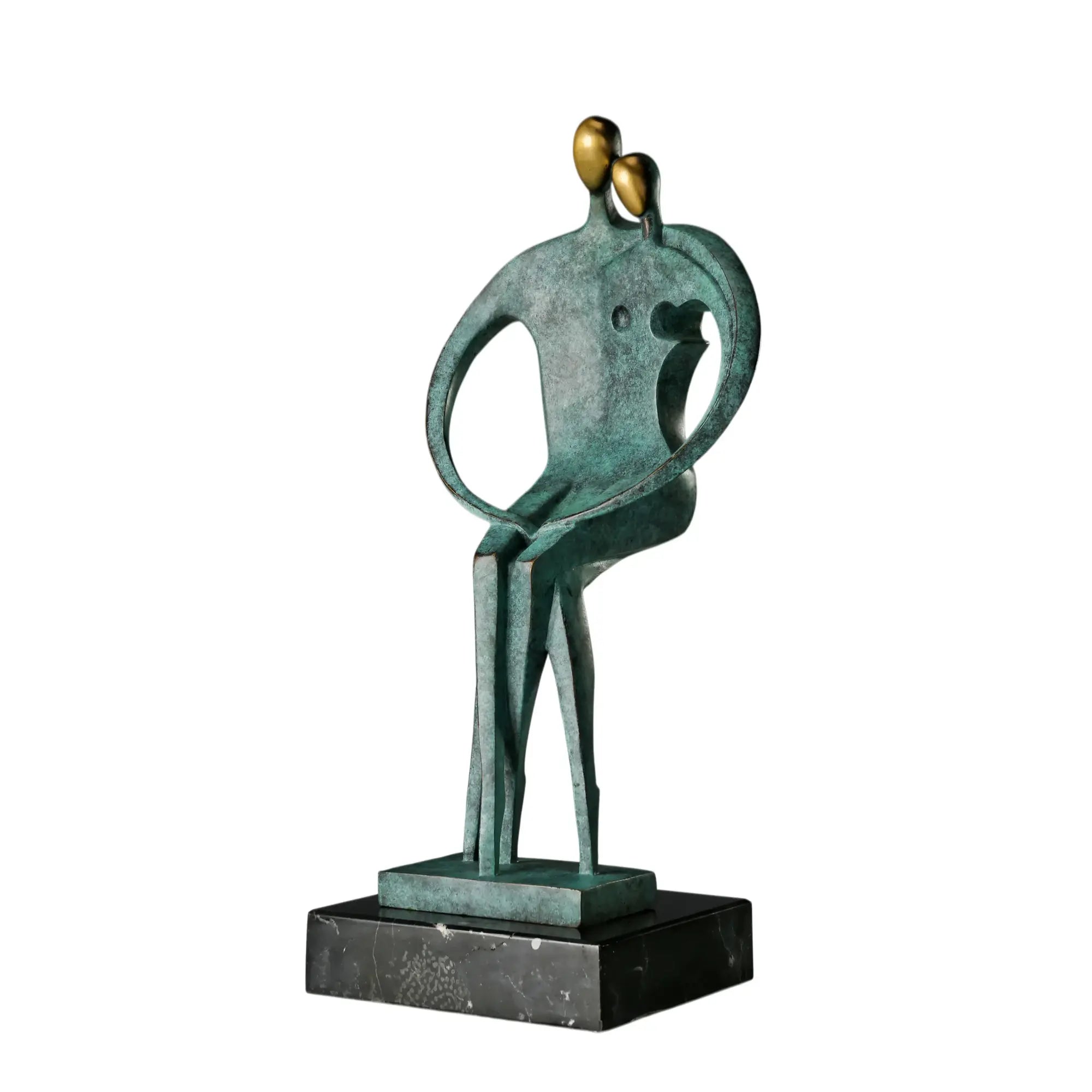 Abstract bronze couple statue with intertwined figures, green patina, and black marble base
