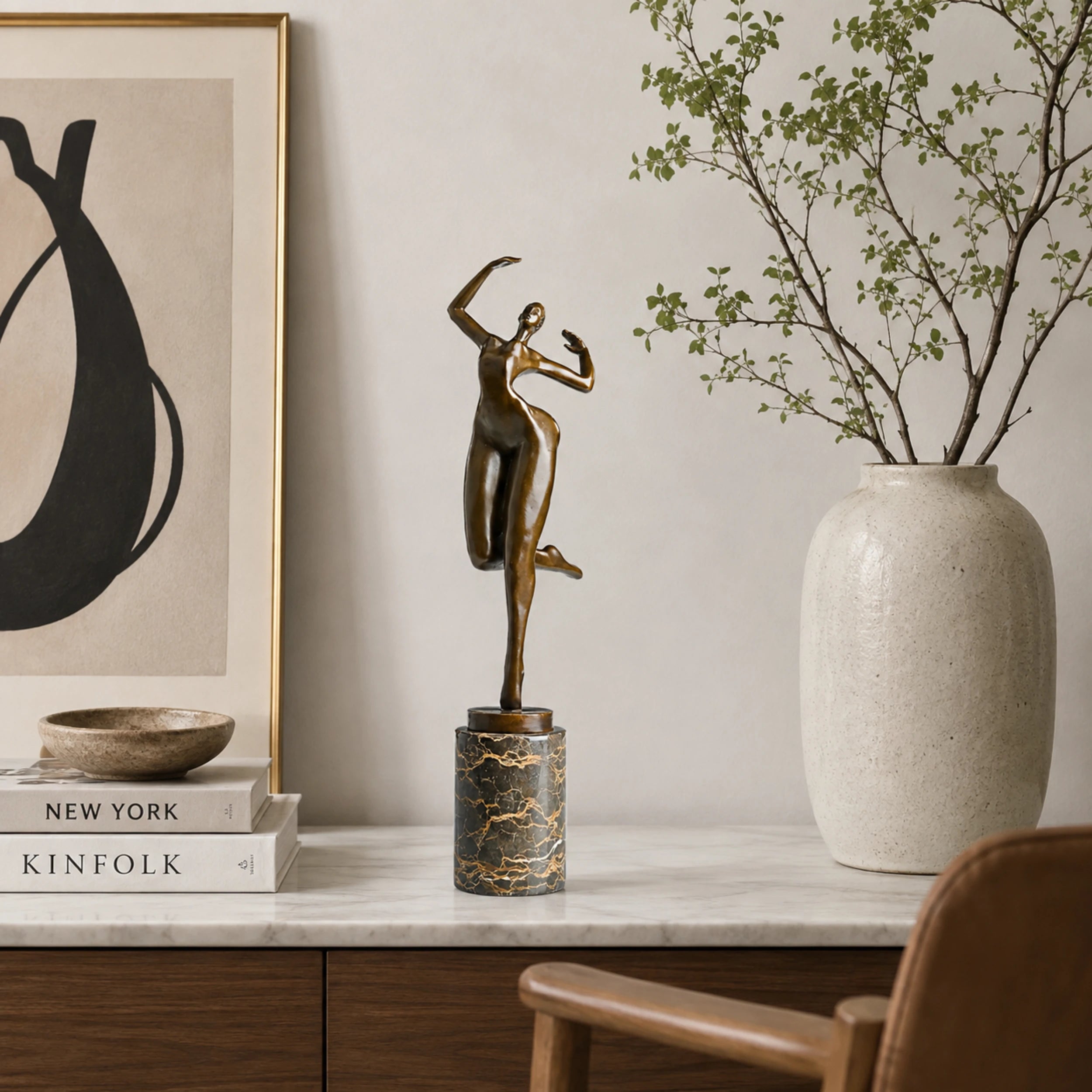 Abstract Female Dancer Bronze Sculpture displayed in a modern interior
