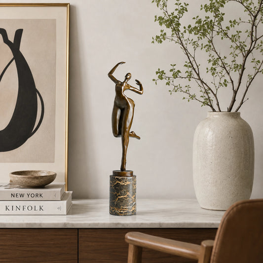 Abstract Female Dancer Bronze Sculpture displayed in a modern interior