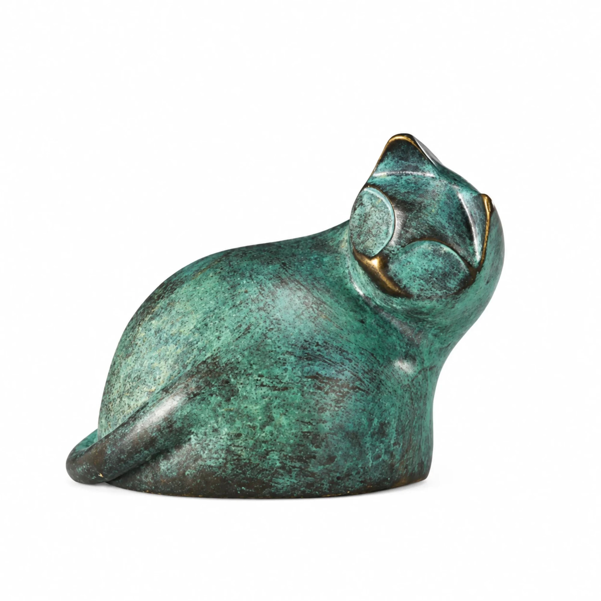 Abstract gazing cat bronze sculpture with green patina displayed in a modern home interior