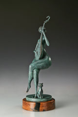 Side view of the abstract bronze pipa player showing the upright instrument and crossed legs