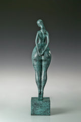 abstract bronze woman sculpture showing the sculpted back and body contours