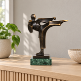 Abstract Taekwondo Bronze Sculpture displayed in a minimalist interior