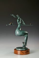 Three-quarter view of an abstract woman bronze sculpture featuring birds, a cat and a drink