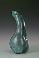 Back angled view of abstract woman bronze sculpture showing its flowing silhouette