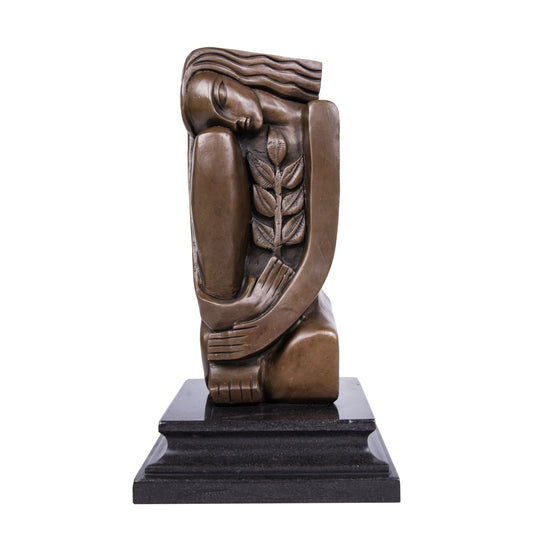 Art Deco seated female bronze sculpture with geometric design and olive branch detail